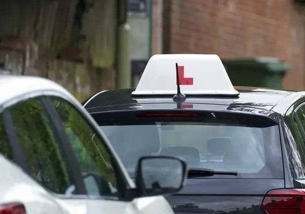 A learner driver drives down a street in Winchester. Picture: Steve Parsons/PA