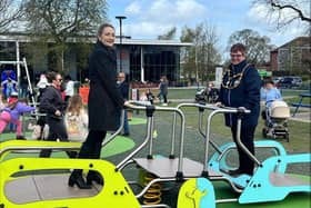 Cllr Mary Walsh, the council’s Executive Member for Planning and Waste, and Town Mayor of Dunstable, Cllr Liz Jones, enjoy one of the new pieces of play equipment. Picture: Central Bedfordshire Council