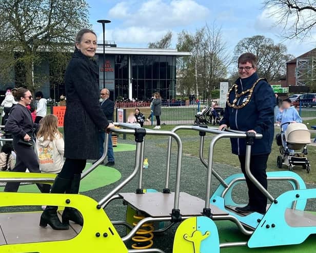 Cllr Mary Walsh, the council’s Executive Member for Planning and Waste, and Town Mayor of Dunstable, Cllr Liz Jones, enjoy one of the new pieces of play equipment. Picture: Central Bedfordshire Council