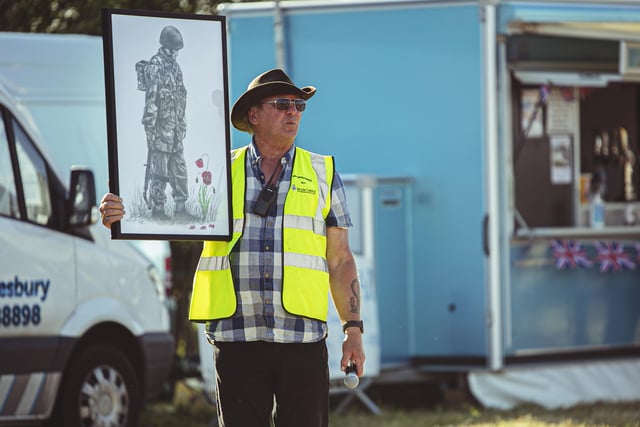 A piece of art was auctioned at the convoy showground and raised £1,000.