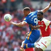 Carlton Morris goes up to win a header for Shrewsbury against Rotherham United in the 2018 League One play-off final