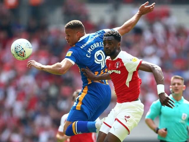 Carlton Morris goes up to win a header for Shrewsbury against Rotherham United in the 2018 League One play-off final
