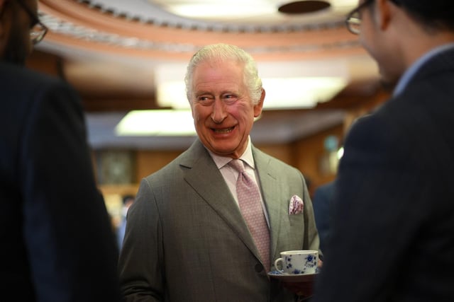 King Charles talks to guests as he visits Luton Town Hall (Photo by DANIEL LEAL/POOL/AFP via Getty Images)