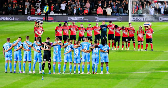 Luton and Coventry line up for a minutes silence to honour the passing of Queen Elizabeth II on Wednesday night