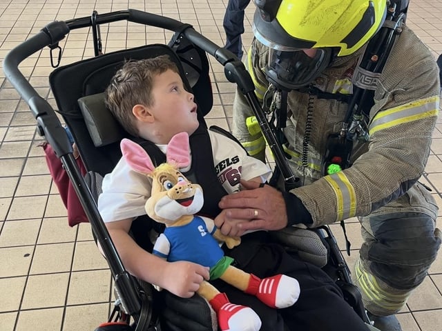 Harrison at the Dunstable fire station with the blue watch crew