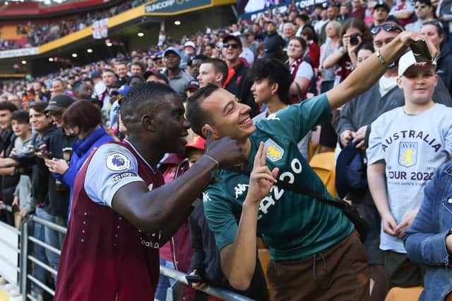Marvelous Nakamba poses for a picture with an Aston Villa supporter - pic: Albert Perez/Getty Images