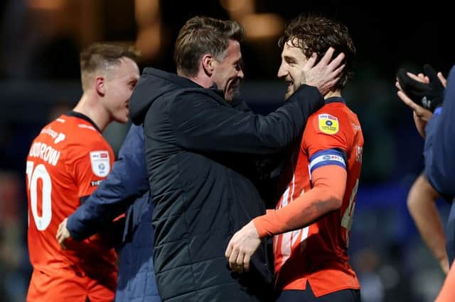 Rob Edwards celebrates Luton's 3-0 win at QPR with defender Tom Lockyer