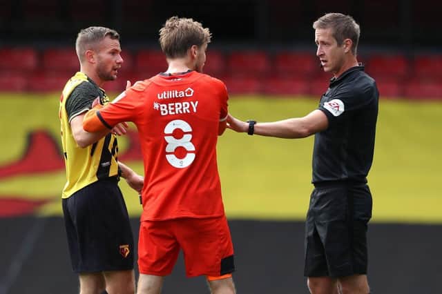 Luke Berry argues with Tom Cleverly during Luton's 1-0 defeat at Watford in September 2020
