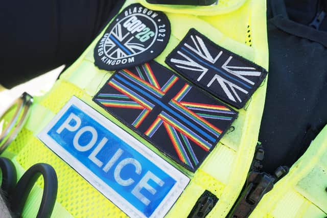 Bedfordshire police officer wearing a rainbow flag badge