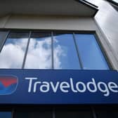 Signage on a Travelodge hotel (Photo by BEN STANSALL/AFP via Getty Images)