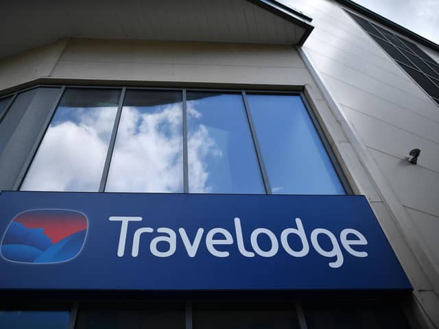 Signage on a Travelodge hotel (Photo by BEN STANSALL/AFP via Getty Images)