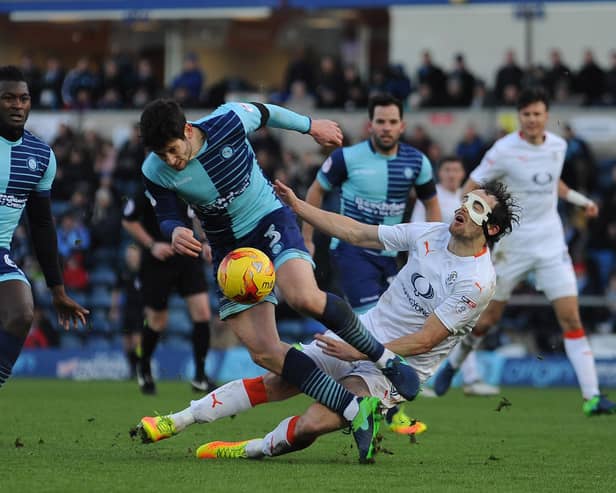 Danny Hylton wears his protective mask during a game against Wycombe Wanderers