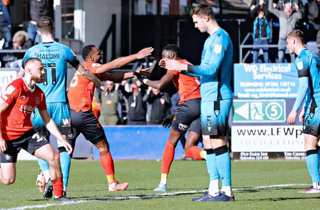 Luton celebrate levelling against Millwall late on at the weekend