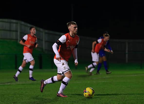 Former Luton youngster Jake Peck in action for the Hatters