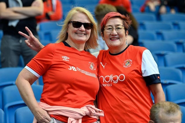 Two Hatters fans await Luton's first ever Premier League game on the south coast