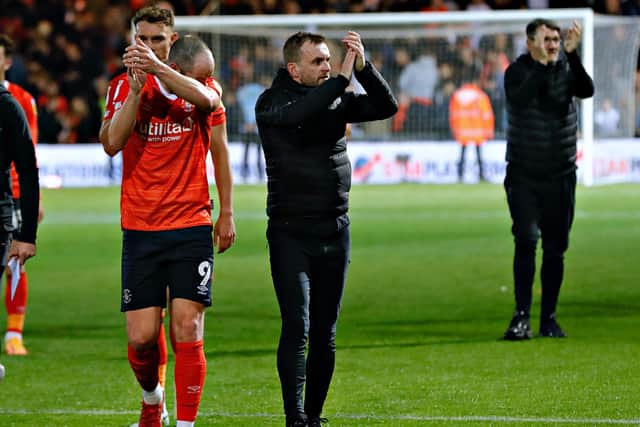 Luton boss Nathan Jones applauds the Town fans after Friday night's 1-1 draw