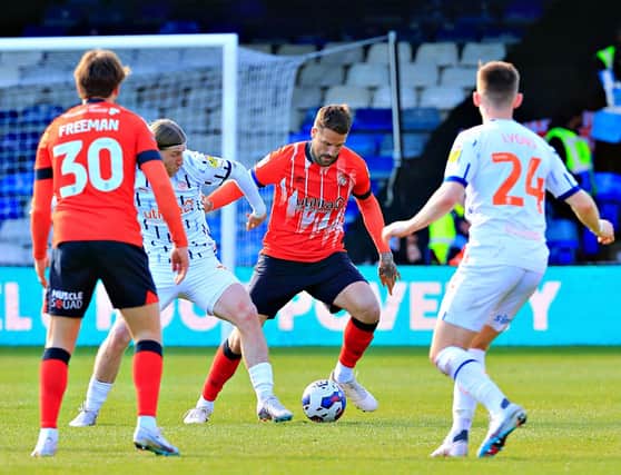 Town defender Sonny Bradley is back for Luton this afternoon