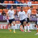 Isaac Vassell celebrates scoring for Luton against Blackpool in May 2017