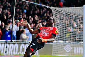Pelly-Ruddock Mpanzu enjoys his second goal during yesterday's win over Blackpool