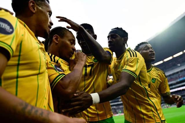 Amari'i Bell celebrates a goal for Jamaica against Mexico recently