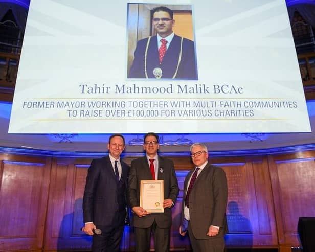 Former Mayor of Luton Tahir Malik receiving his British Citizen Award for Services to Community (BCAc).