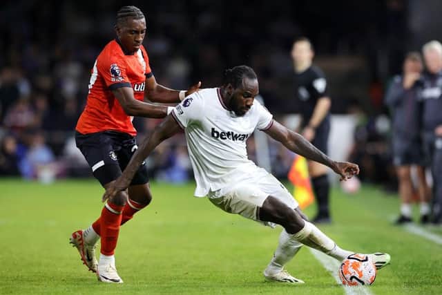Amari'i Bell battles Jamaica team-mate Michail Antonio during Luton's 2-1 defeat to West Ham on Friday night - pic: David Rogers/Getty Images