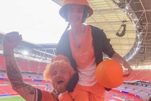 Micky Hyde with his daughter at Wembley after Luton Town were promoted to the Premier League.
