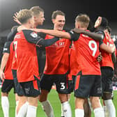 Luton's players celebrate Callum Marshall's opener from the penalty spot - pic: Andy Fitzsimons
