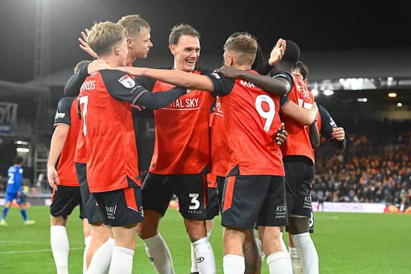 Luton's players celebrate Callum Marshall's opener from the penalty spot - pic: Andy Fitzsimons