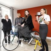 Pedalling towards a more sustainable future - Central Beds councillor Antonia Ryan demonstrates just how much power is required. Also in the pic (from left) mayor Yvonne Farrell, Cllr Susan Goodchild, Cllr Antonia Ryan (on bike) and sales adviser Jade.