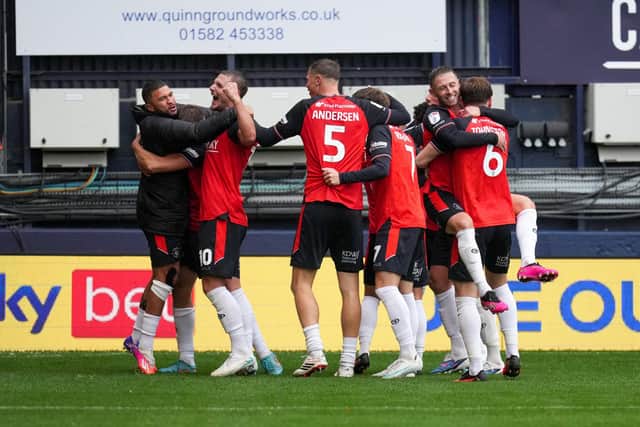 Luton celebrate Callum Marshall's injury time winner against Leicester - pic: David Horn
