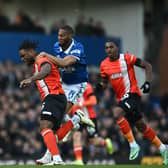 Teden Mengi gets to the ball ahead of Everton striker Beto during Luton's 2-1 FA Cup win on Saturday - pic: PAUL ELLIS/AFP via Getty Images