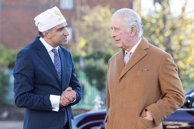 King Charles III speaks with Professor Gurch Randhawa, a member of the Sikh Congregation during a visit to Guru Nanak Gurdwara (Photo by Chris Jackson/Getty Images)