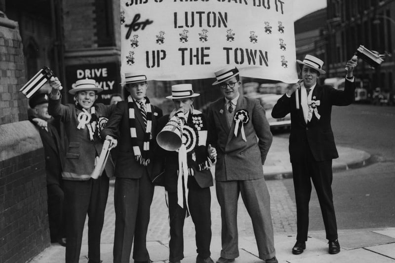 A group of Luton Town supporters gather at London's St Pancras station on their way to the 1959 FA Cup Final against Nottingham Forest at Wembley. Luton Town were to lose 2-1.