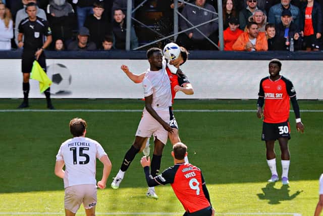 Lasse Nordas is fouled by Plymouth defender Brendan Wiredu for a penalty - pic: Liam Smith