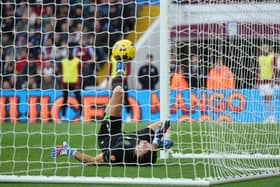 Emiliano Martinez scores an own-goal as Luton Town grab a consolation at Villa Park this afternoon - pic: Eddie Keogh/Getty Images