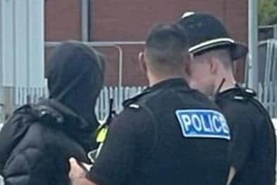 A man is arrested by police officers. Picture: Bedfordshire Police