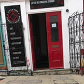 The front door of Little Red Arts which is on the brink of collapse after a new council ban on night-time loading