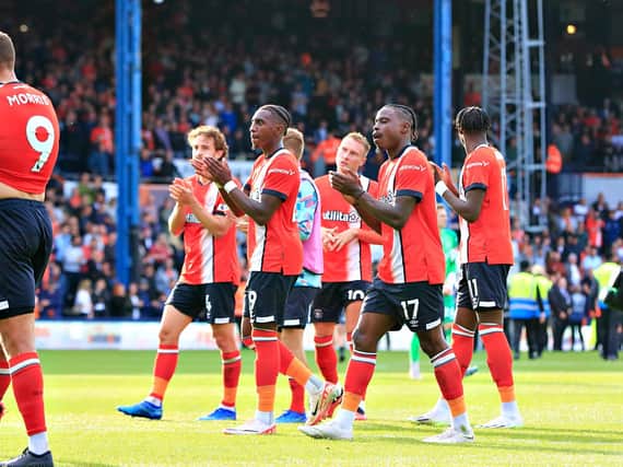 Luton's players applaud Town's supporters after drawing 1-1 with Wolves