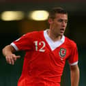 New Luton manager Rob Edwards in action for Wales during his international career