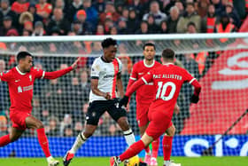 Sambi Lokonga looks to make a pass against Liverpool - pic: Liam Smith