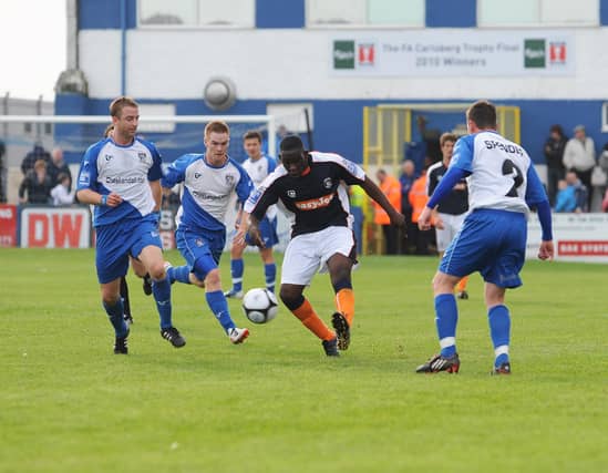Former Luton midfielder Godfrey Poku has hung up his boots - pic: Hatters Heritage