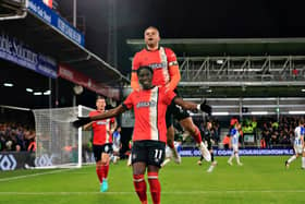 Luton striker Elijah Adebayo celebrates scoring against Brighton - pic: Liam Smith
