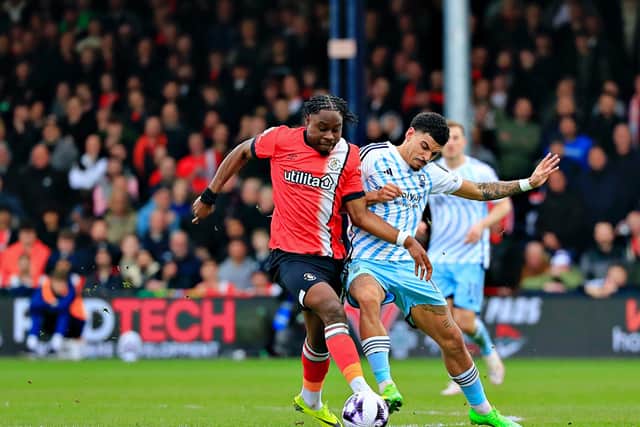 Pelly Ruddock Mpanzu battles for the ball against Nottingham Forest - pic: Liam Smith