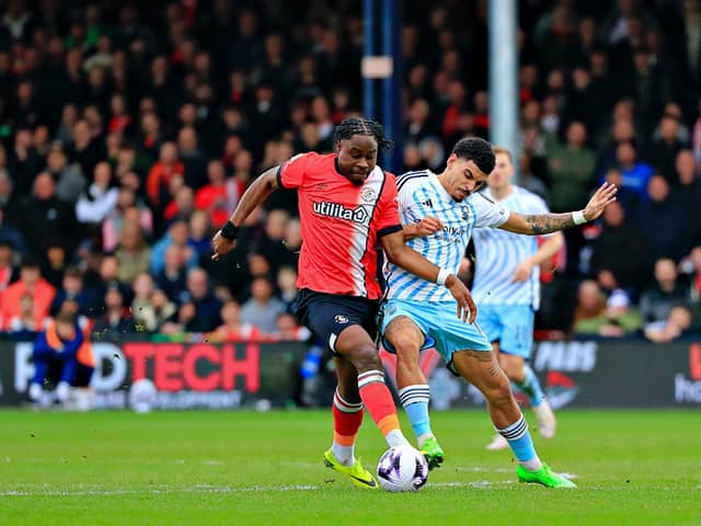 Pelly Ruddock Mpanzu battles for the ball against Nottingham Forest - pic: Liam Smith