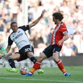Tom Lockyer stops Carlos Vinicius from making it 2-0 in stoppage time against Fulham - pic: Christopher Lee/Getty Images