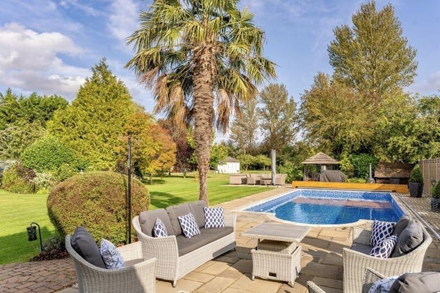 How incredible is this outdoor entertaining space - including the heated outdoor pool!