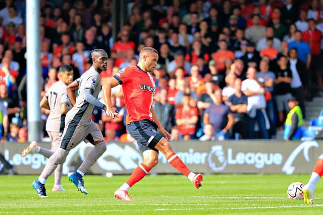 Carlton Morris makes a pass against Tottenham Hotspur recently - pic: Liam Smith