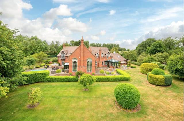 You can see the house and its landscaped gardens here - it sits on 4.25 acres of secluded land