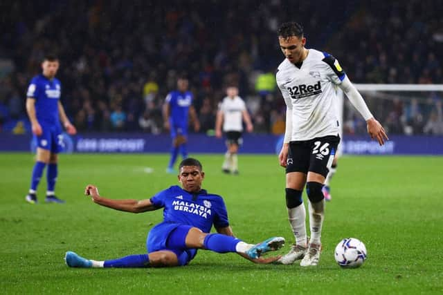 Cody Drameh makes a sliding challenge during his loan move at Cardiff City last season